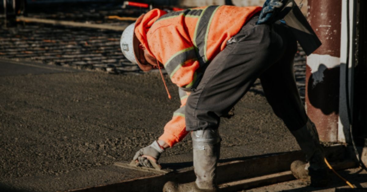 Crew performing commercial concrete services in Lee’s Summit, MO, for parking lot paving