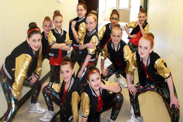 Hip Hop Dancers posing backstage