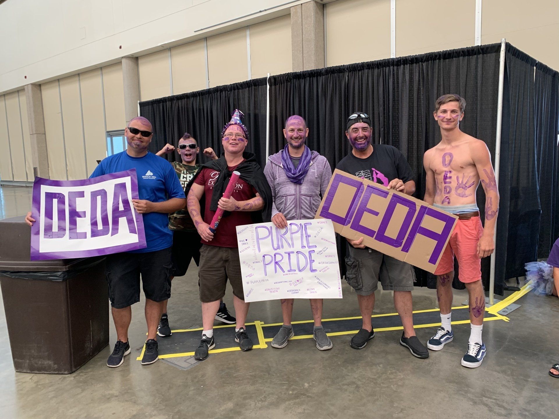 6 Men with DEDA Pure Pride Banners