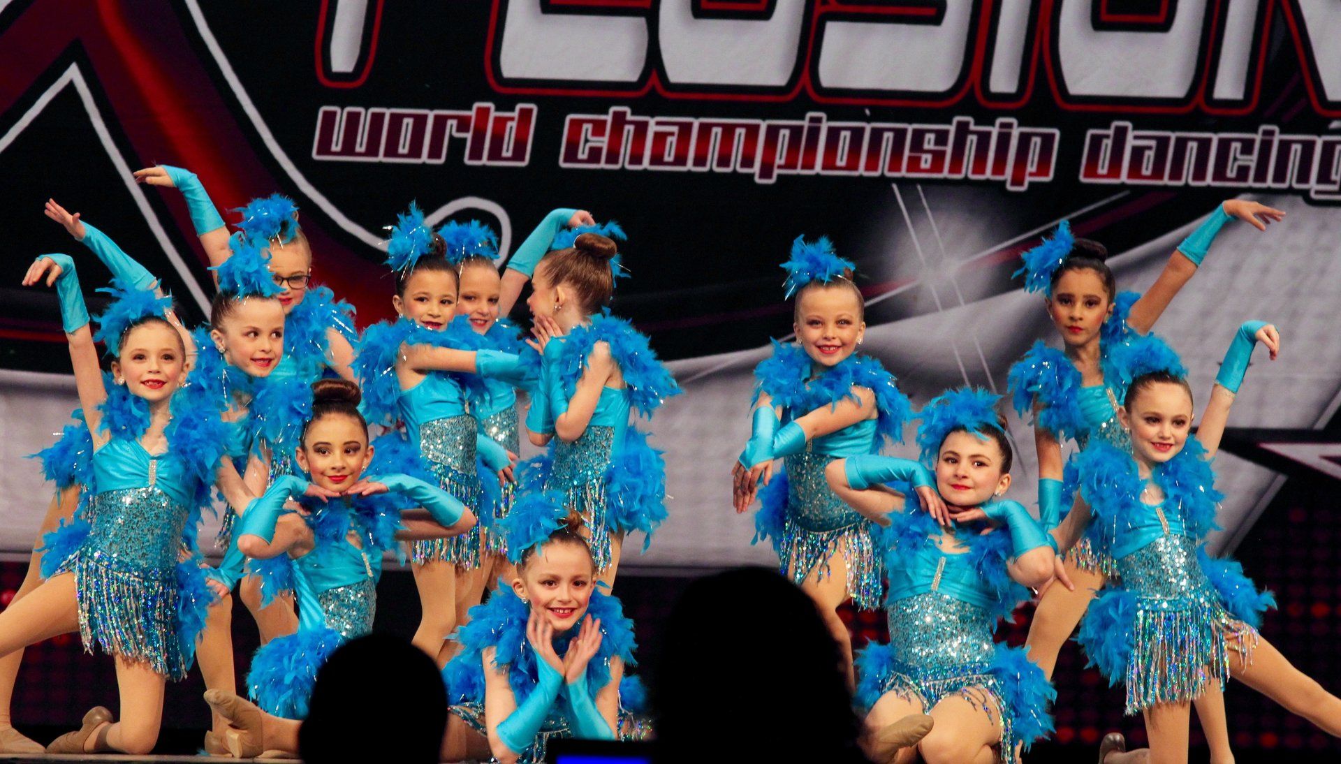 Blue outfit dance performers