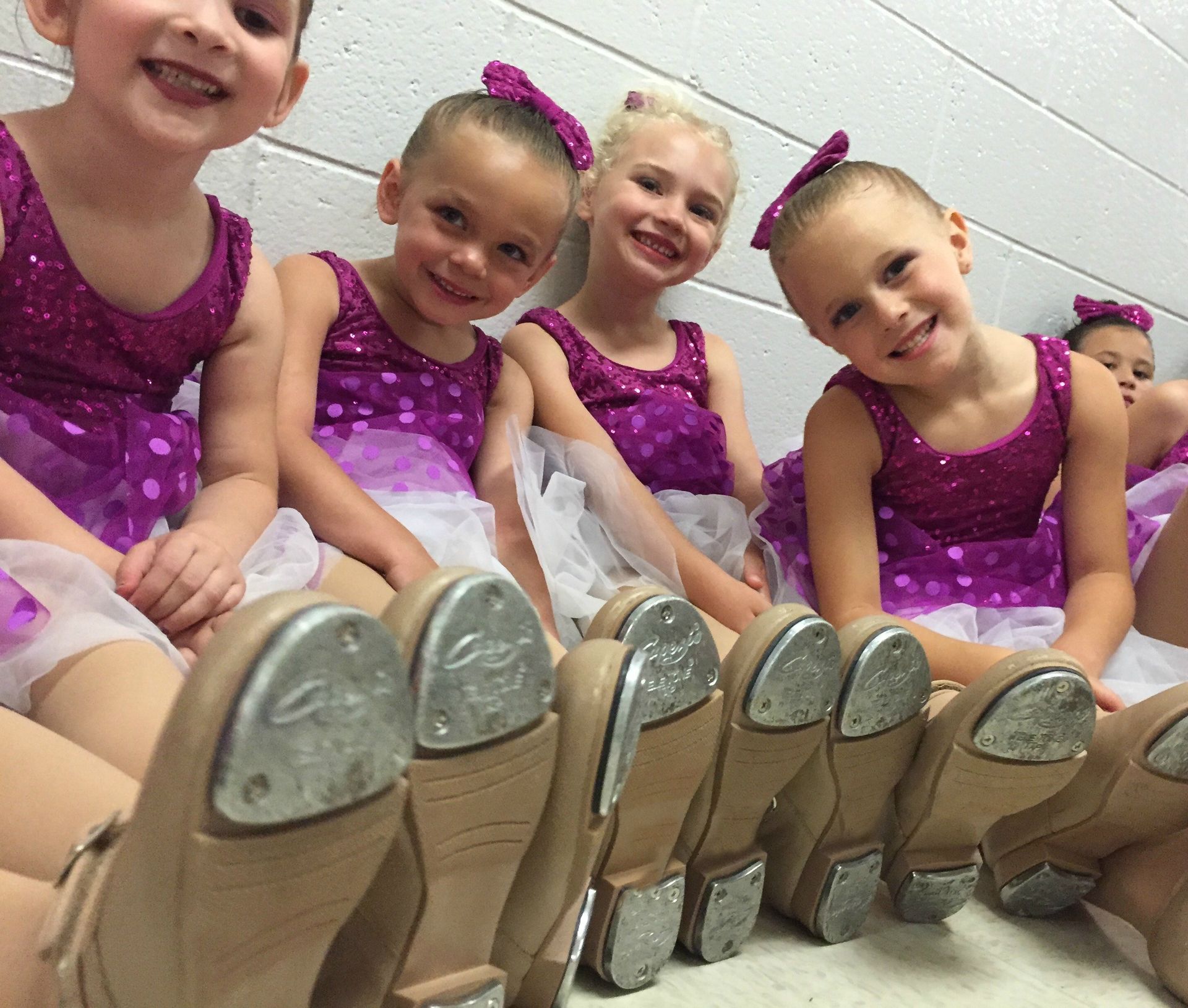 Four Smiling Tap Dancers