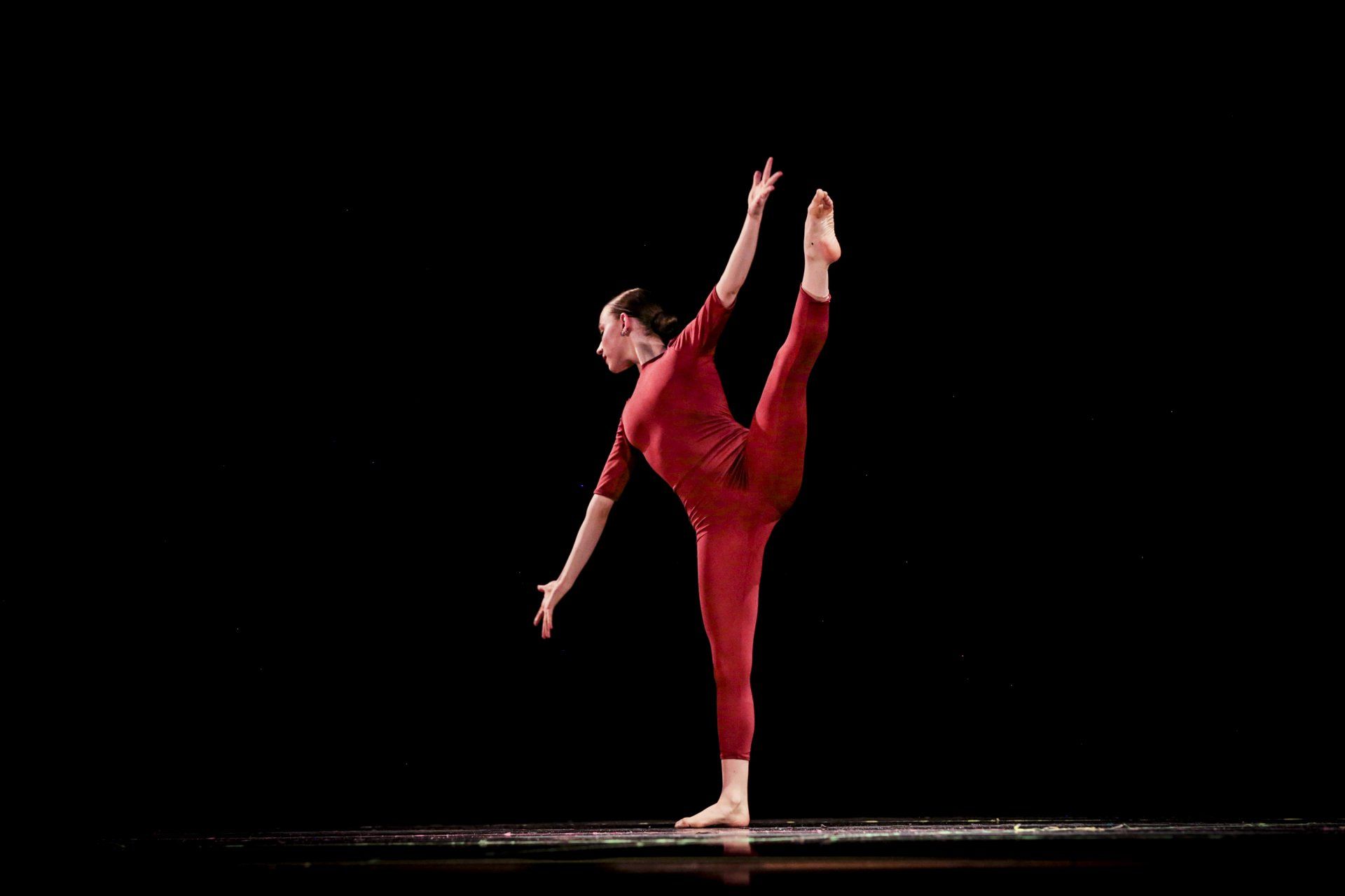 Mid stance red outfit dance performance