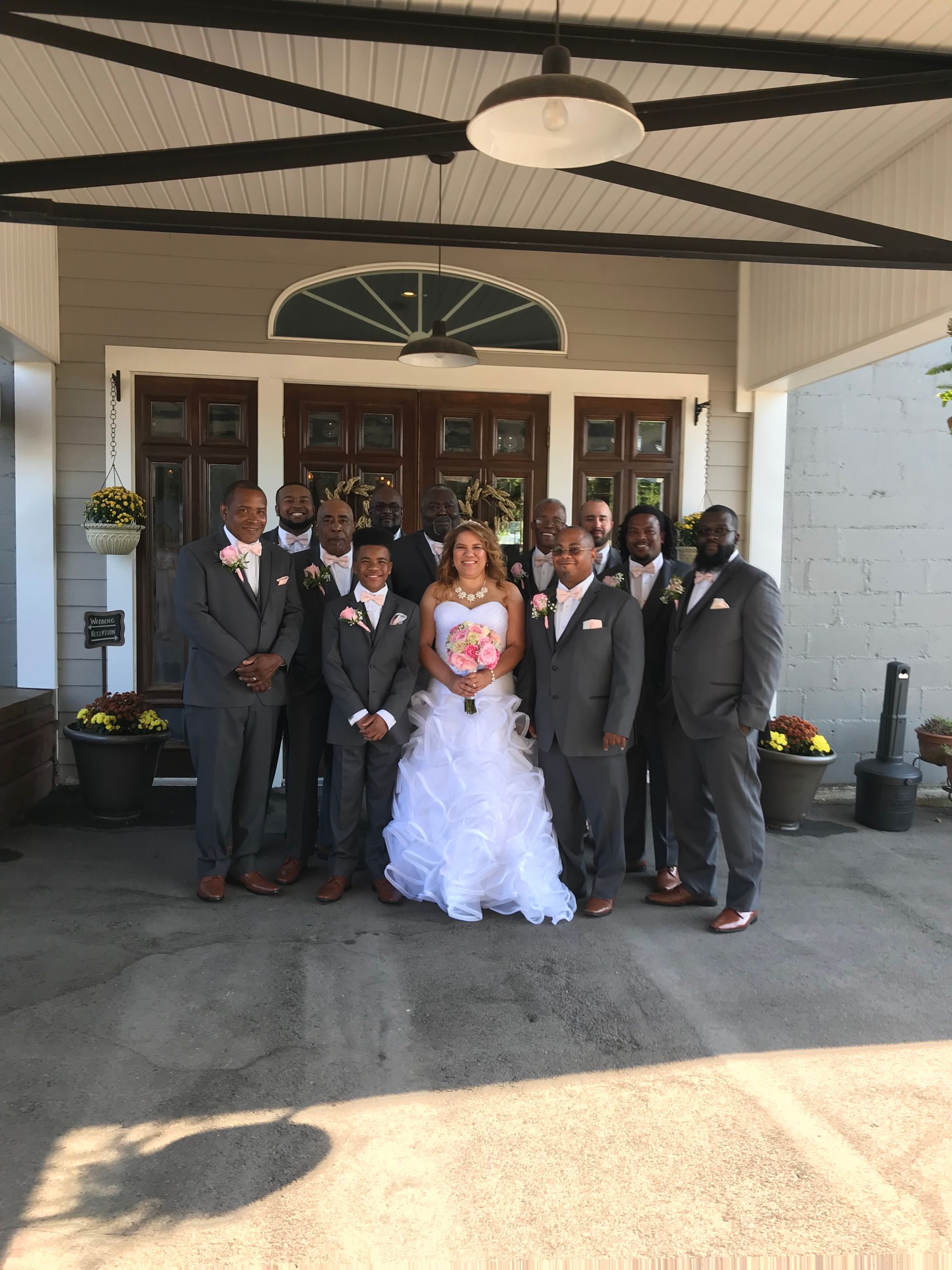 bride and groom with wedding party