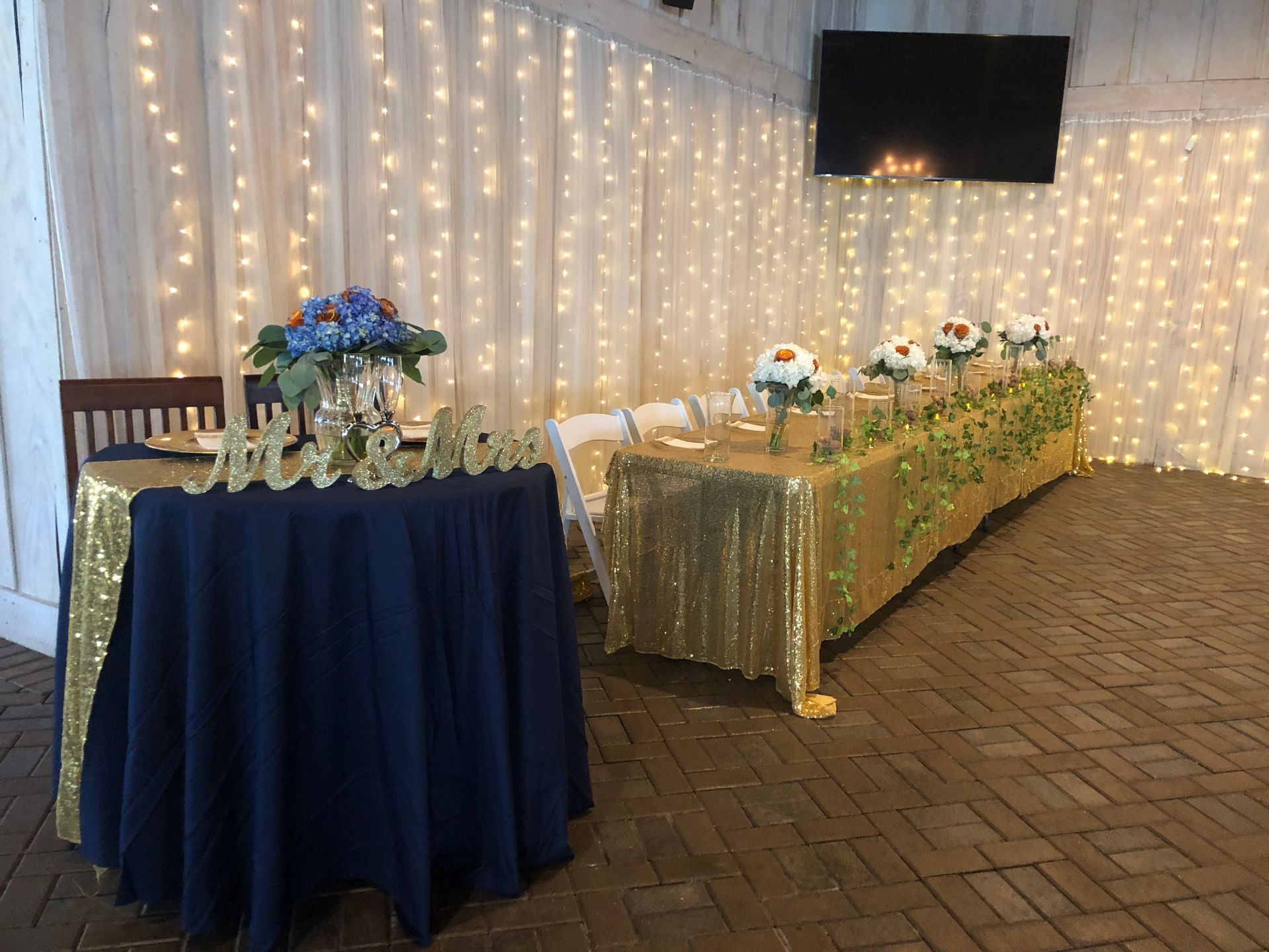 black and gold themed wedding reception