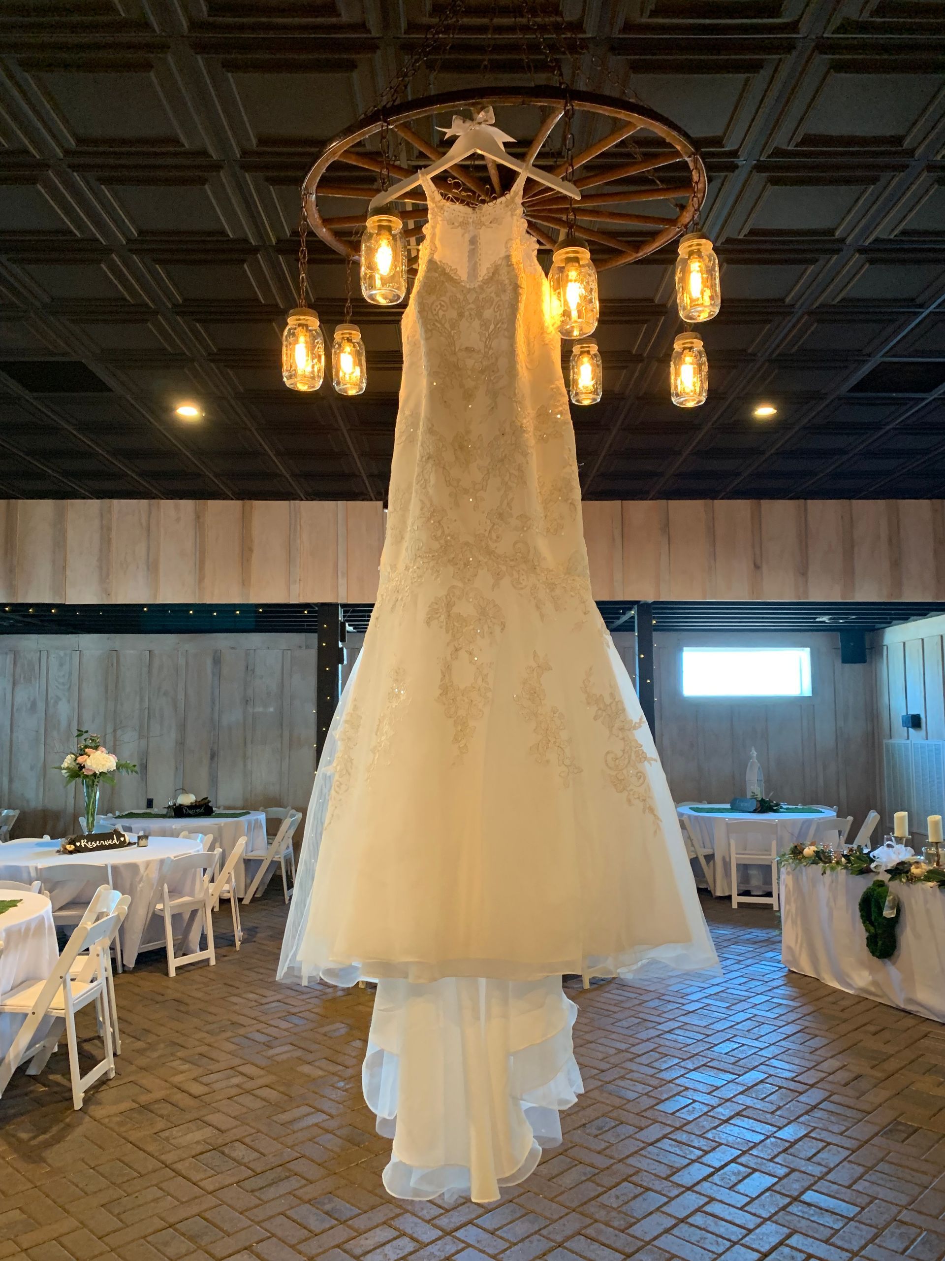 bride in flowing lace wedding gown