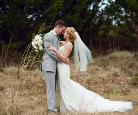 bride and groom embracing