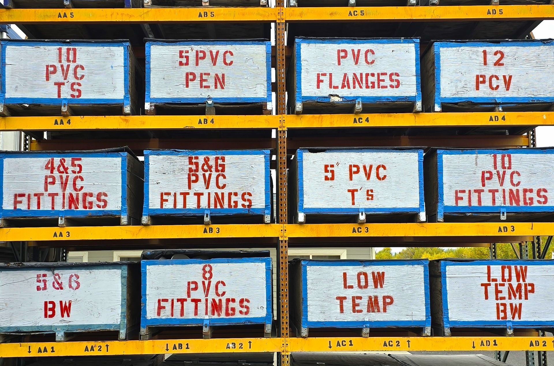 A row of stainless steel doors in a warehouse