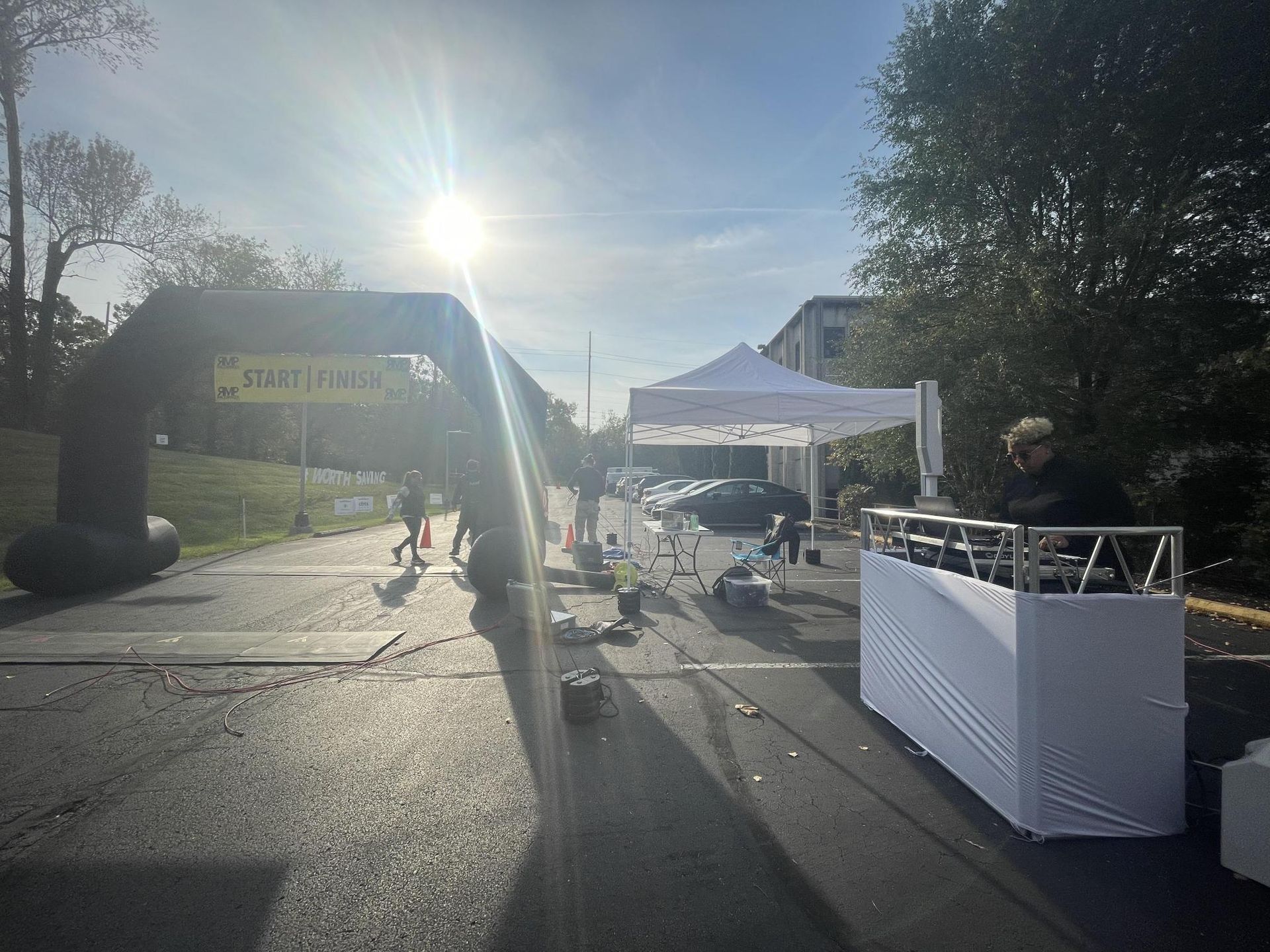 A man is standing in front of a sign that says saint pierre.