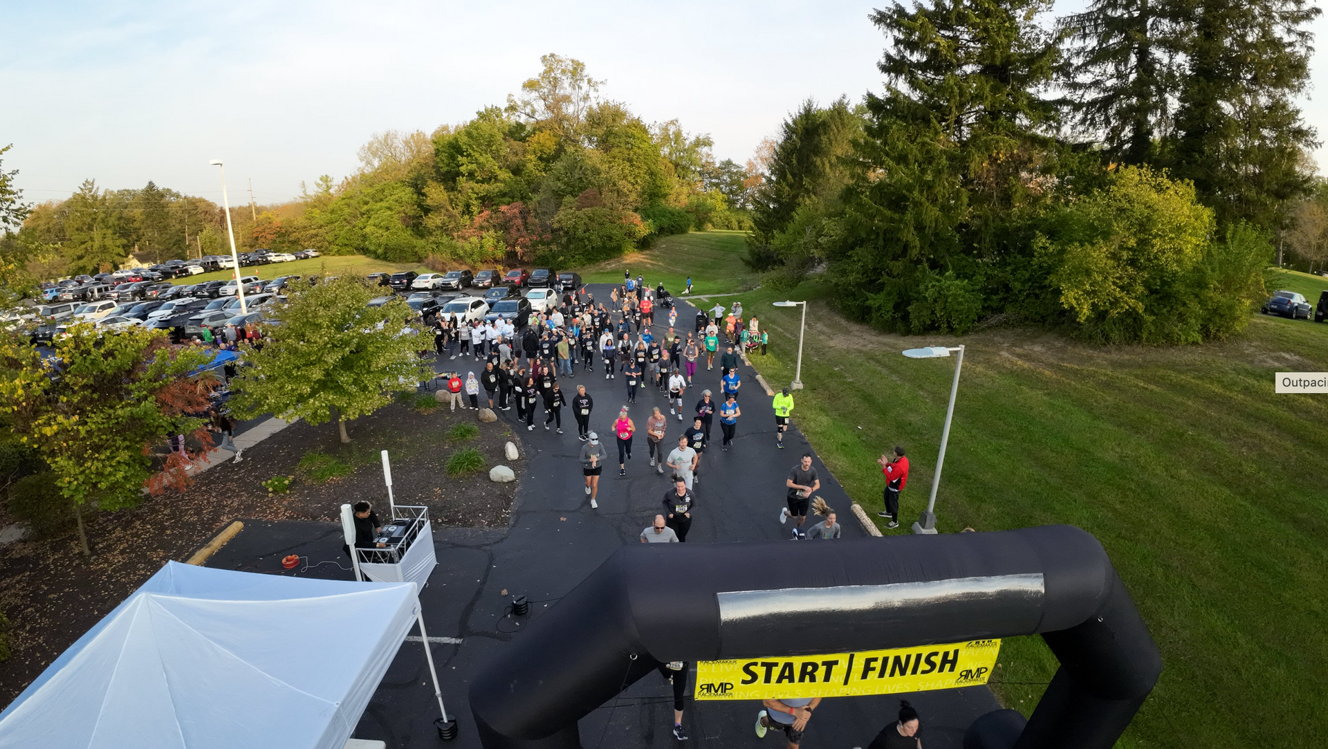 An aerial view of a group of people running a race.