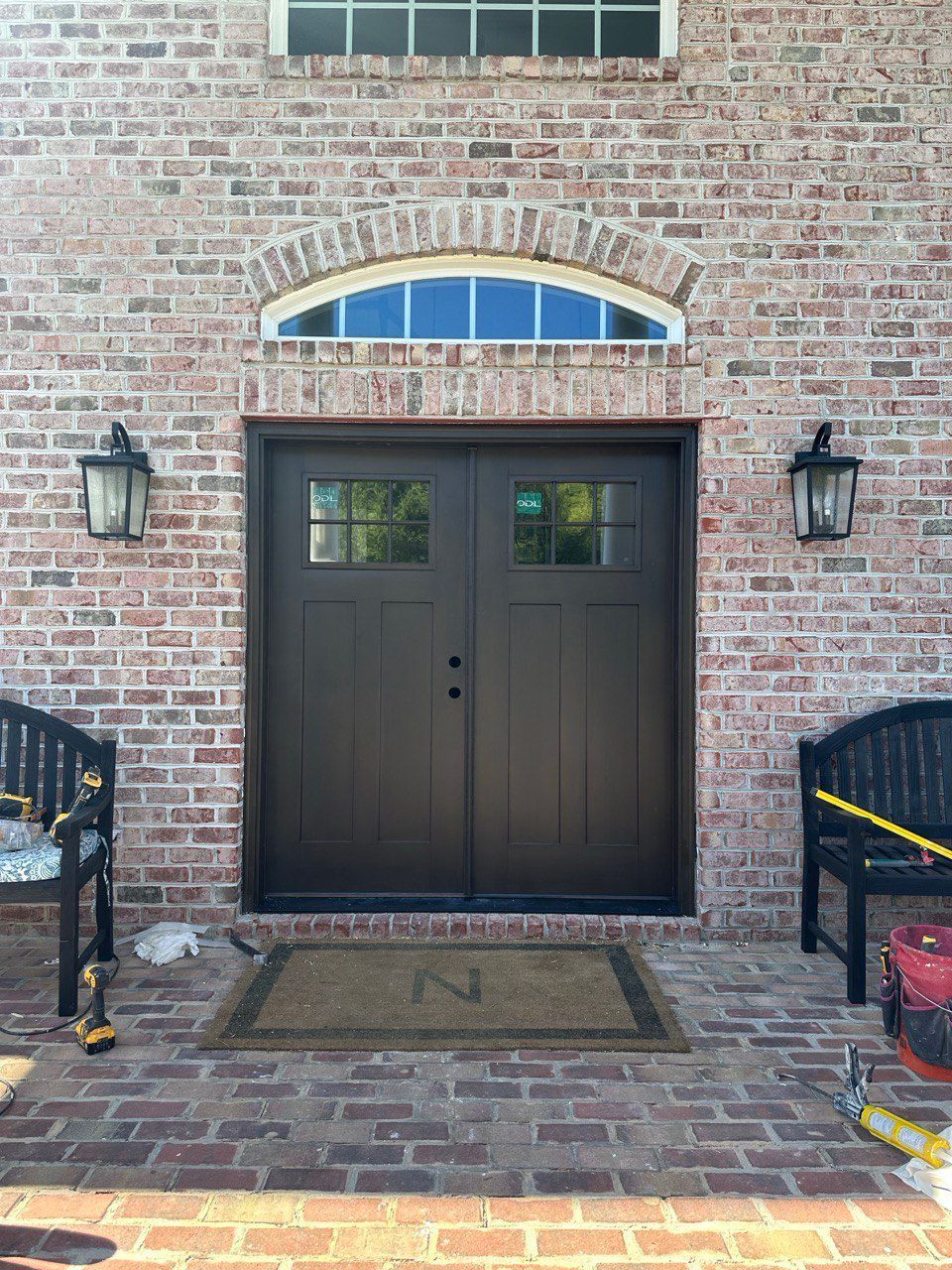 Double French doors with upper glass panes – leading to patio in Owings Mills home