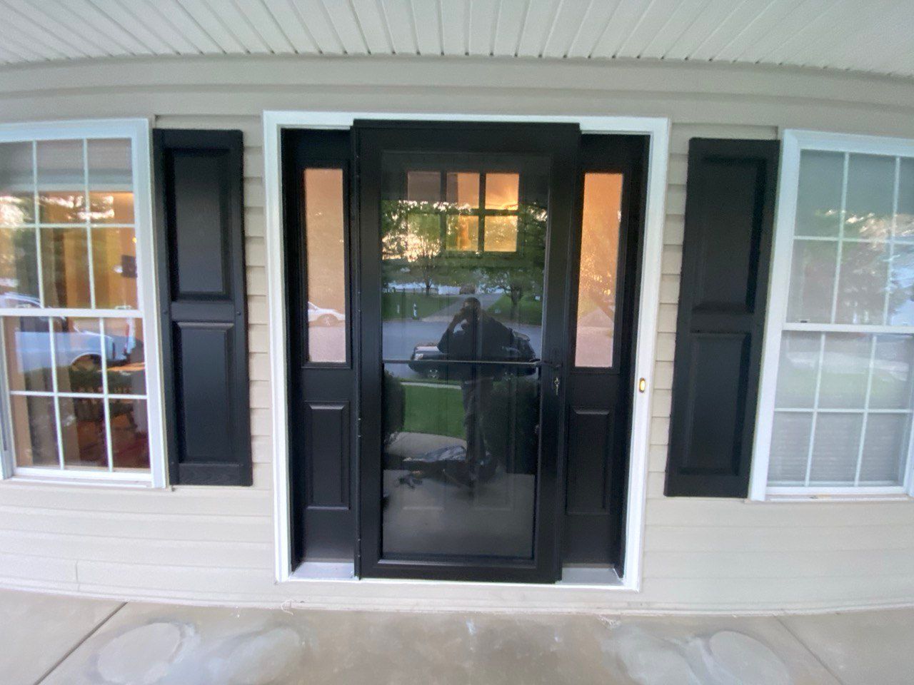 Front entry door with two three-quarter sidelights and storm door – exterior upgrade in Owings Mills, MD