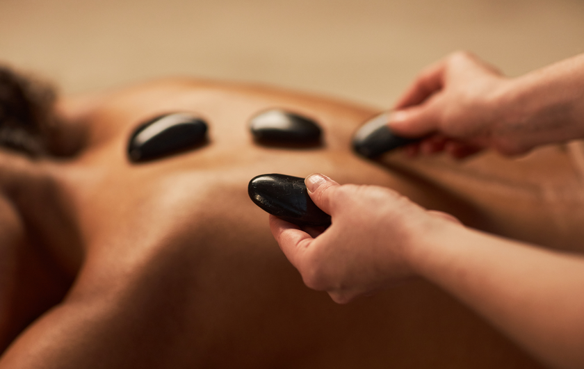 taking a massage with stones