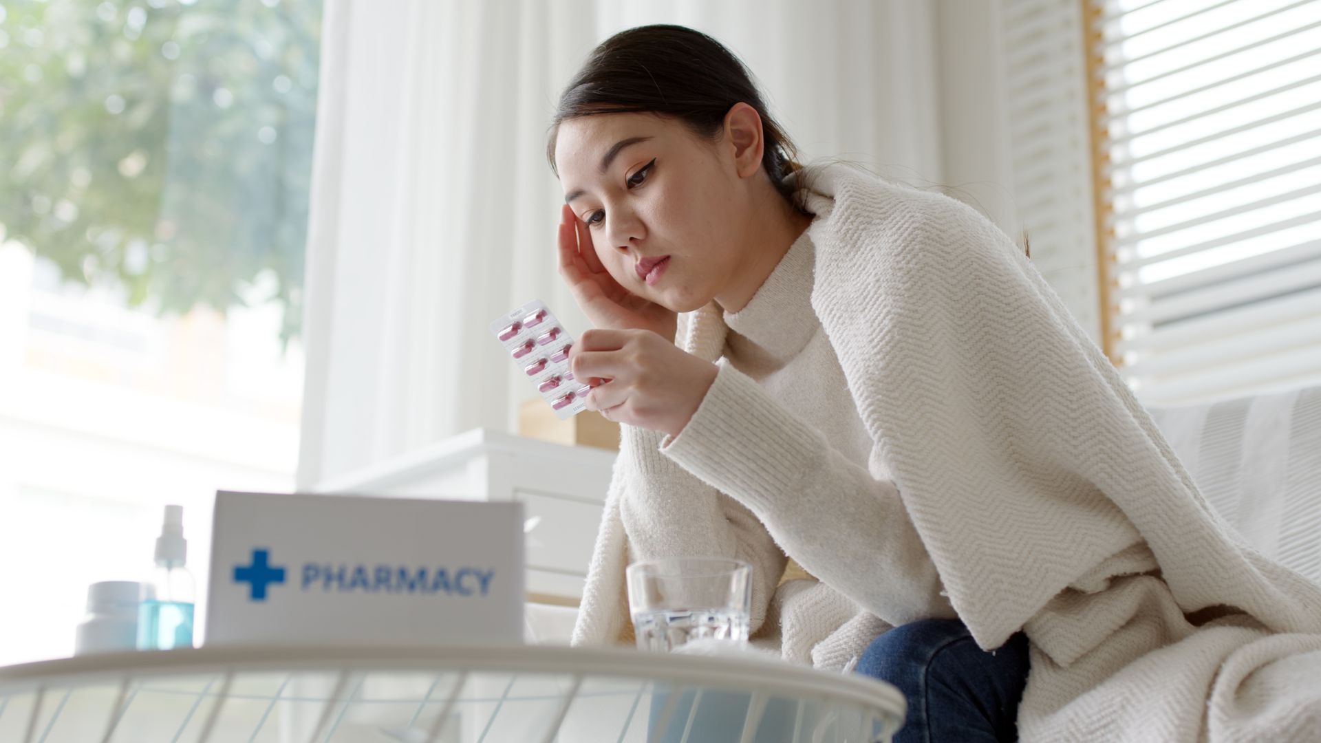 A woman is taking medication for anxiety.