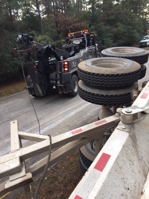 Commercial Vehicle Towing — Towing a Tipped Over White Truck in Houston, TX