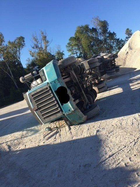 Truck Towing —  Tipped Over Heavy Duty Truck in Houston, TX