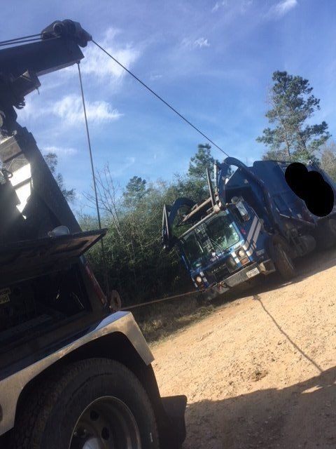 Rig Towing — Towing Blue Truck in Houston, TX