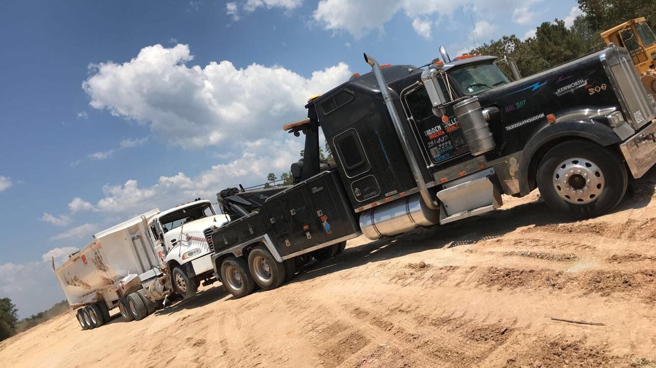 Rig Towing —  Towing White Truck in Houston, TX