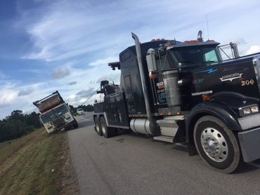 Commercial Vehicle Recovery — Black Towing Truck in Houston, TX