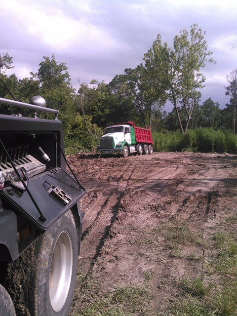 Semi-Truck Towing  — Towing a Semi-truck on a Muddy Road in Houston, TX