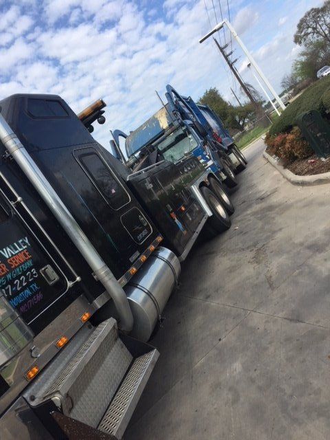 Heavy Duty Towing — Two Trucks on Side Road in Houston, TX