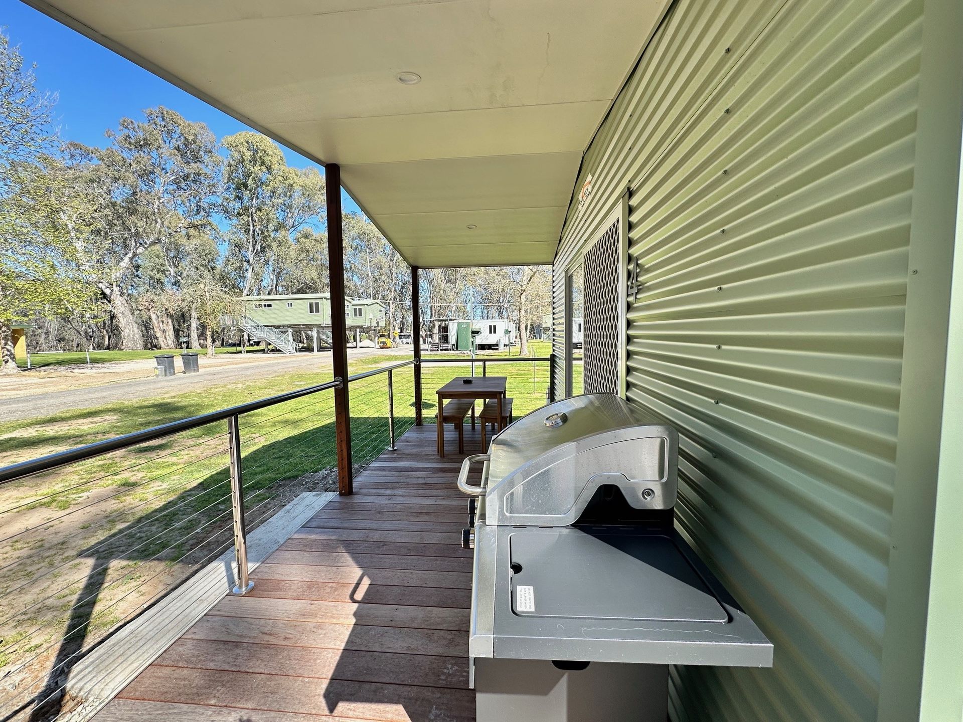 deck in the 2 bedroom cabins at Darlington Point Caravan Park