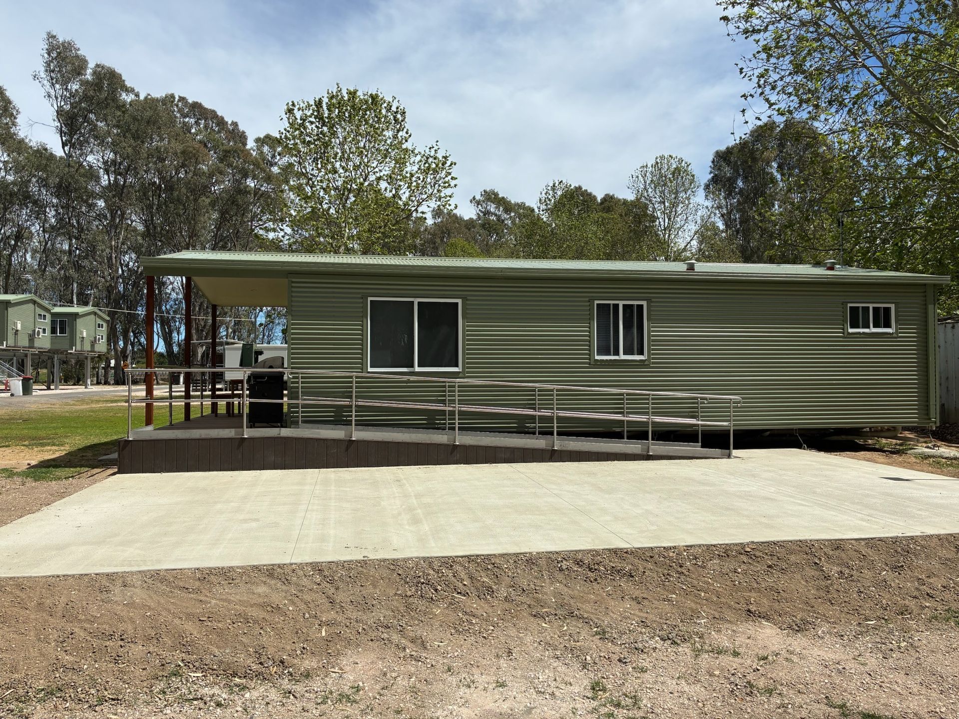 Side view of the accessible 2 bedroom cabin at Darlington Point Caravan Park