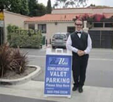 Valet Services - Valet Giving Car Key To Businessperson in Garden Grove, CA