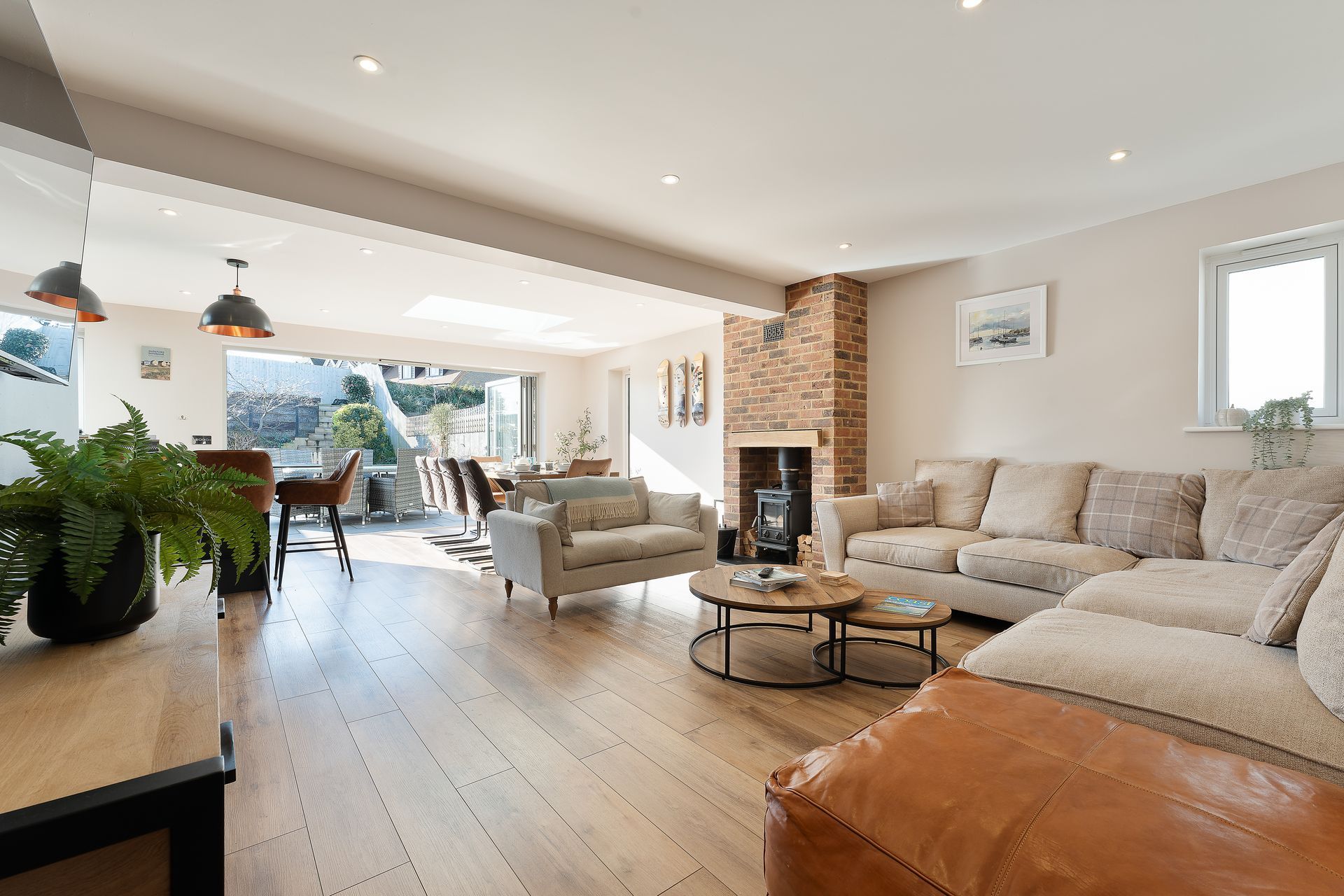 A living room filled with furniture and a fireplace.