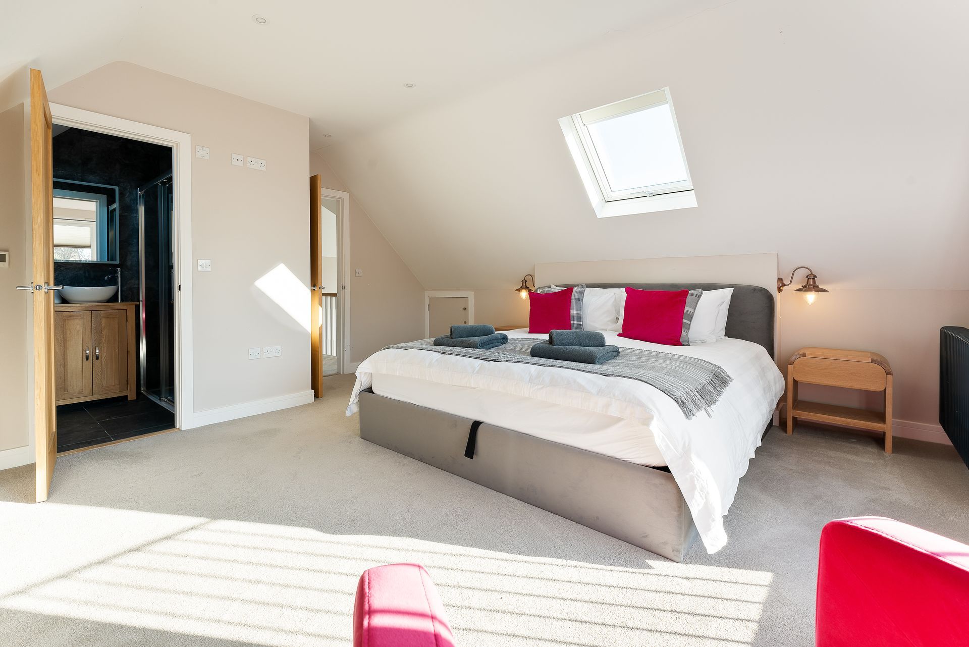 There is a large bed in the middle of the room.