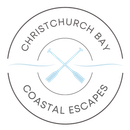 A logo for christchurch bay coastal escapes