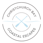 A logo for christchurch bay coastal escapes