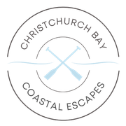A logo for christchurch bay coastal escapes