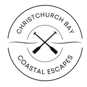 A logo for christchurch bay coastal escapes