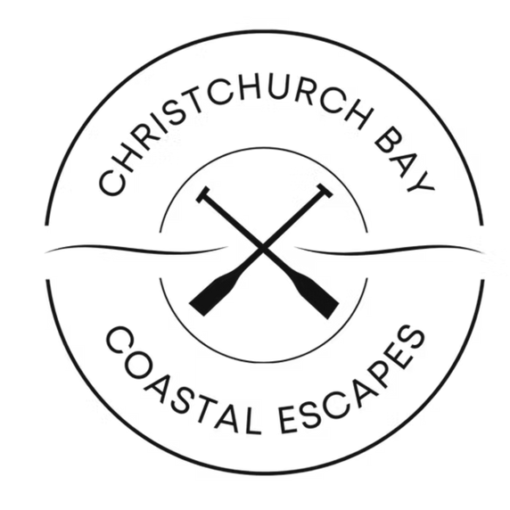 A logo for christchurch bay coastal escapes