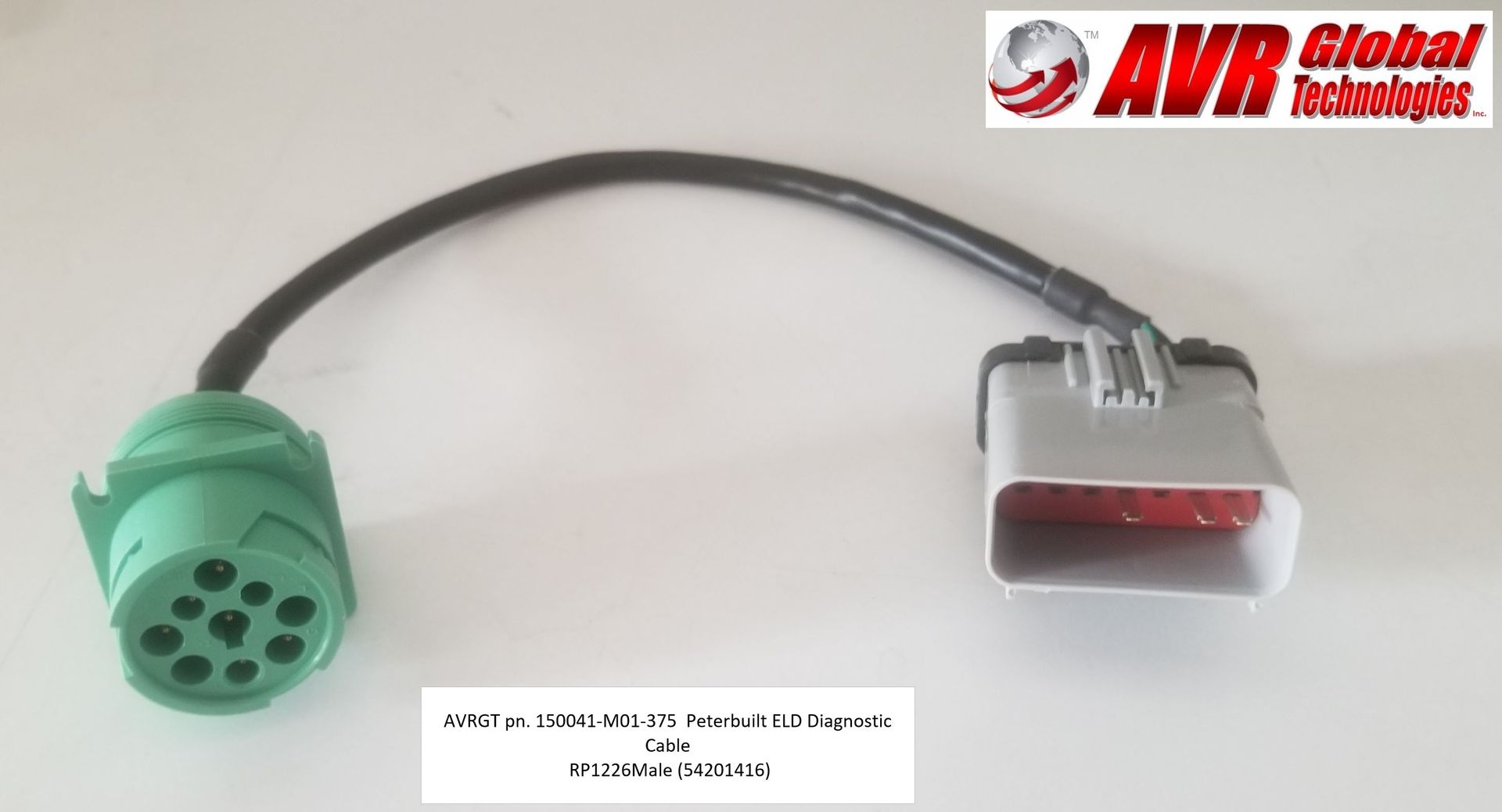 A green connector with a black cable attached to it