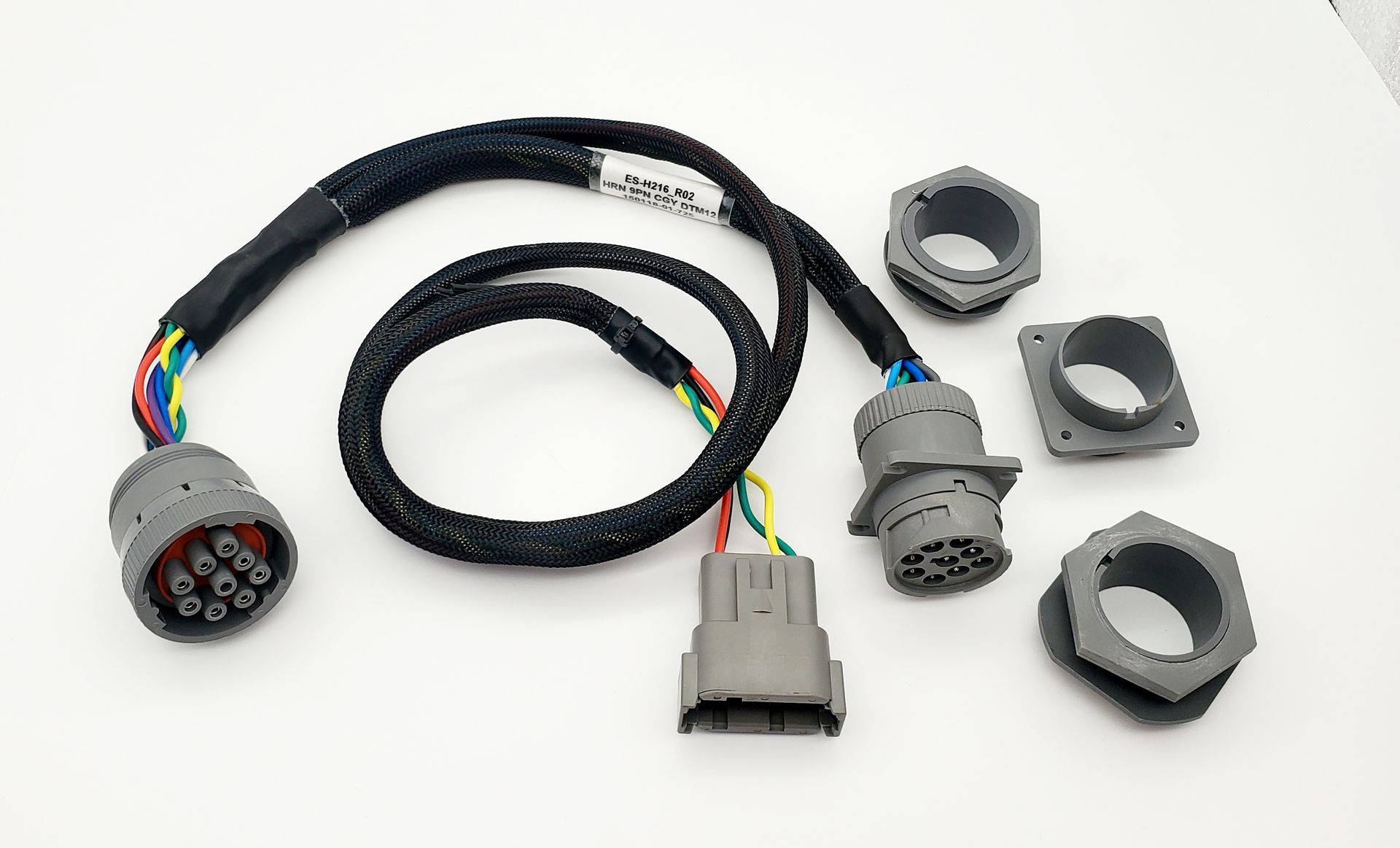 A bunch of wires and connectors on a white surface