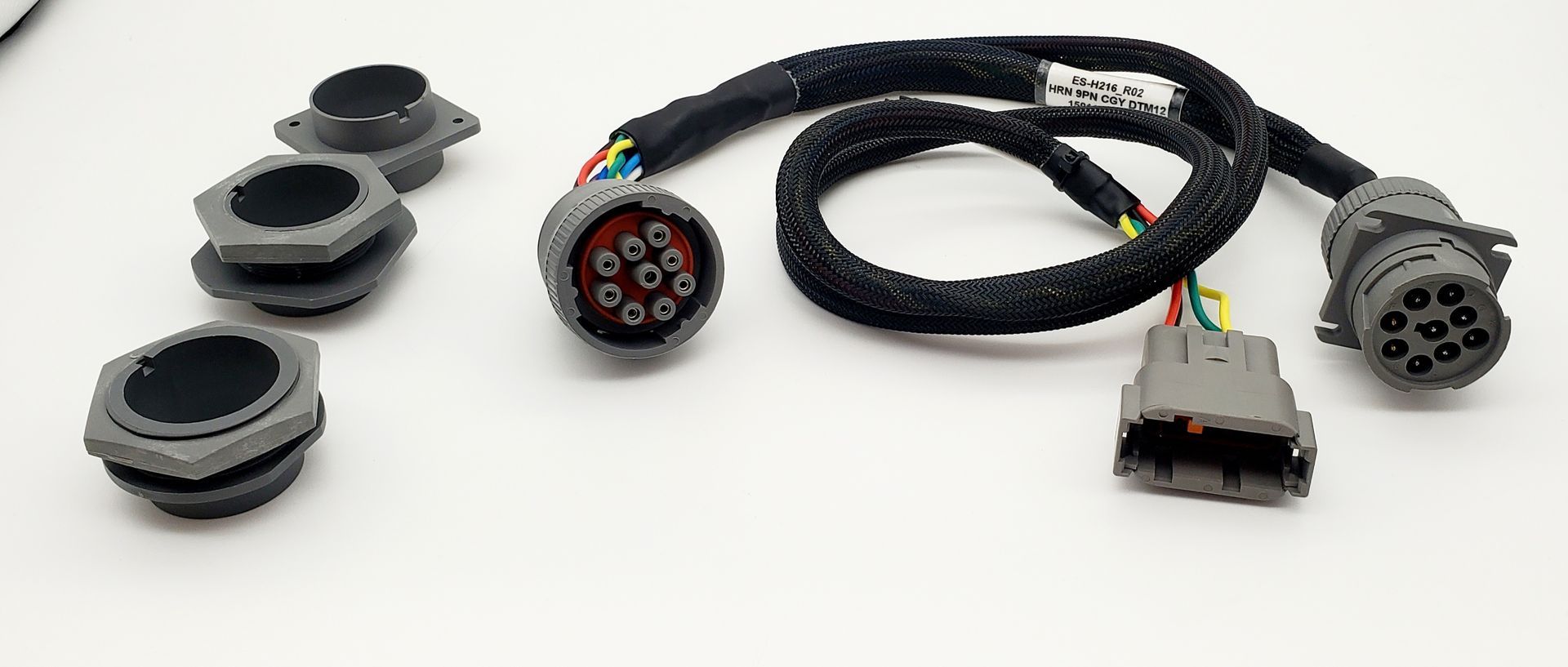 A bunch of wires are connected to each other on a white surface.