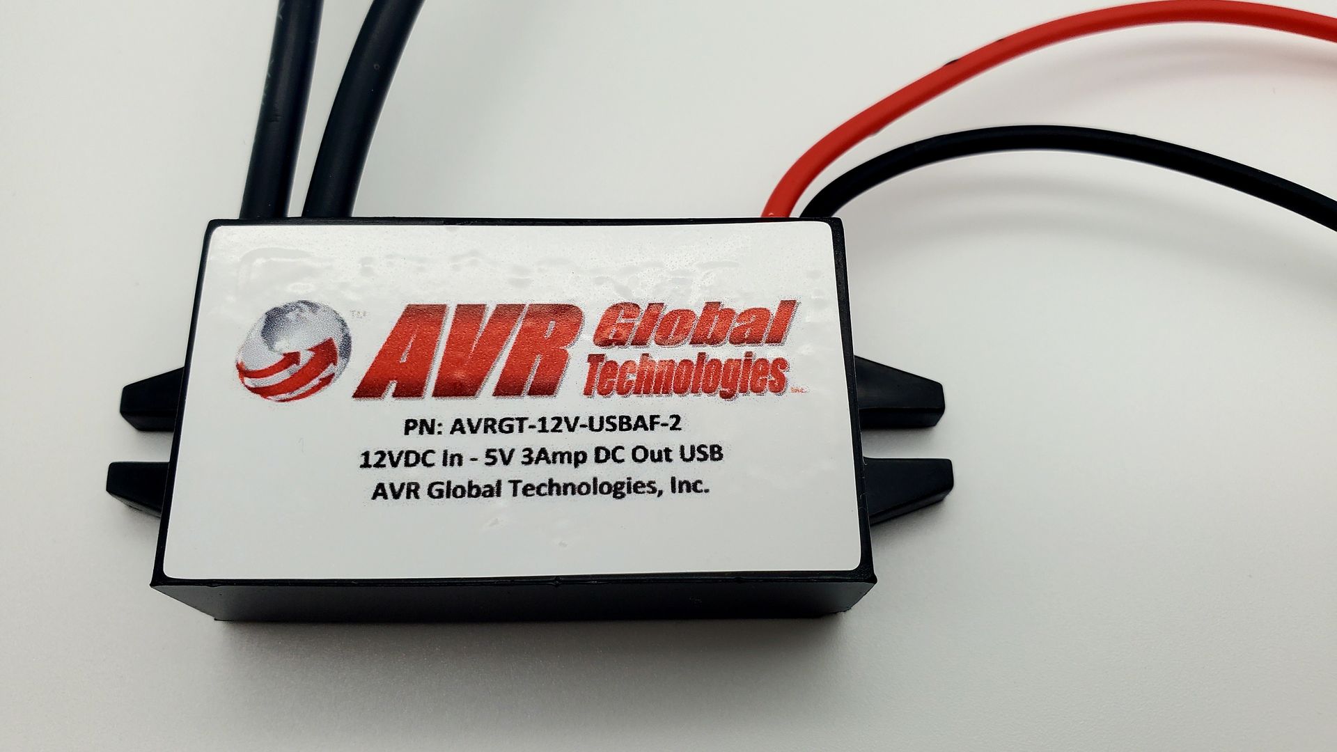 A box with a label that says avr global technologies