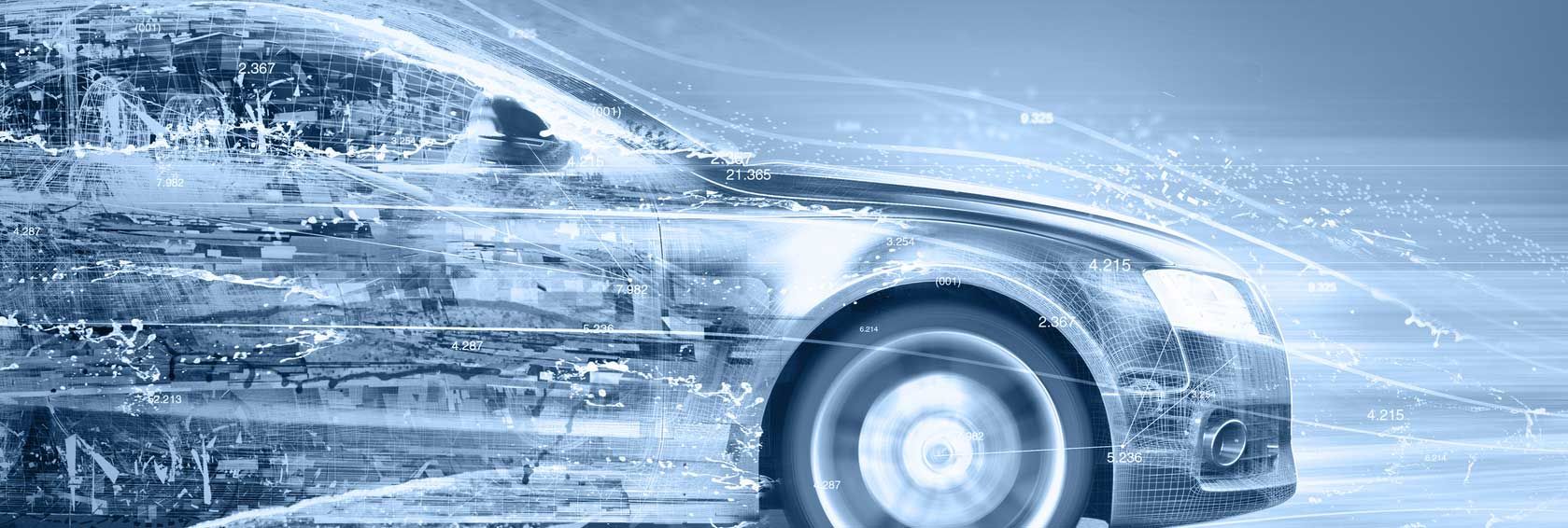 A car is driving through the snow on a snowy road.