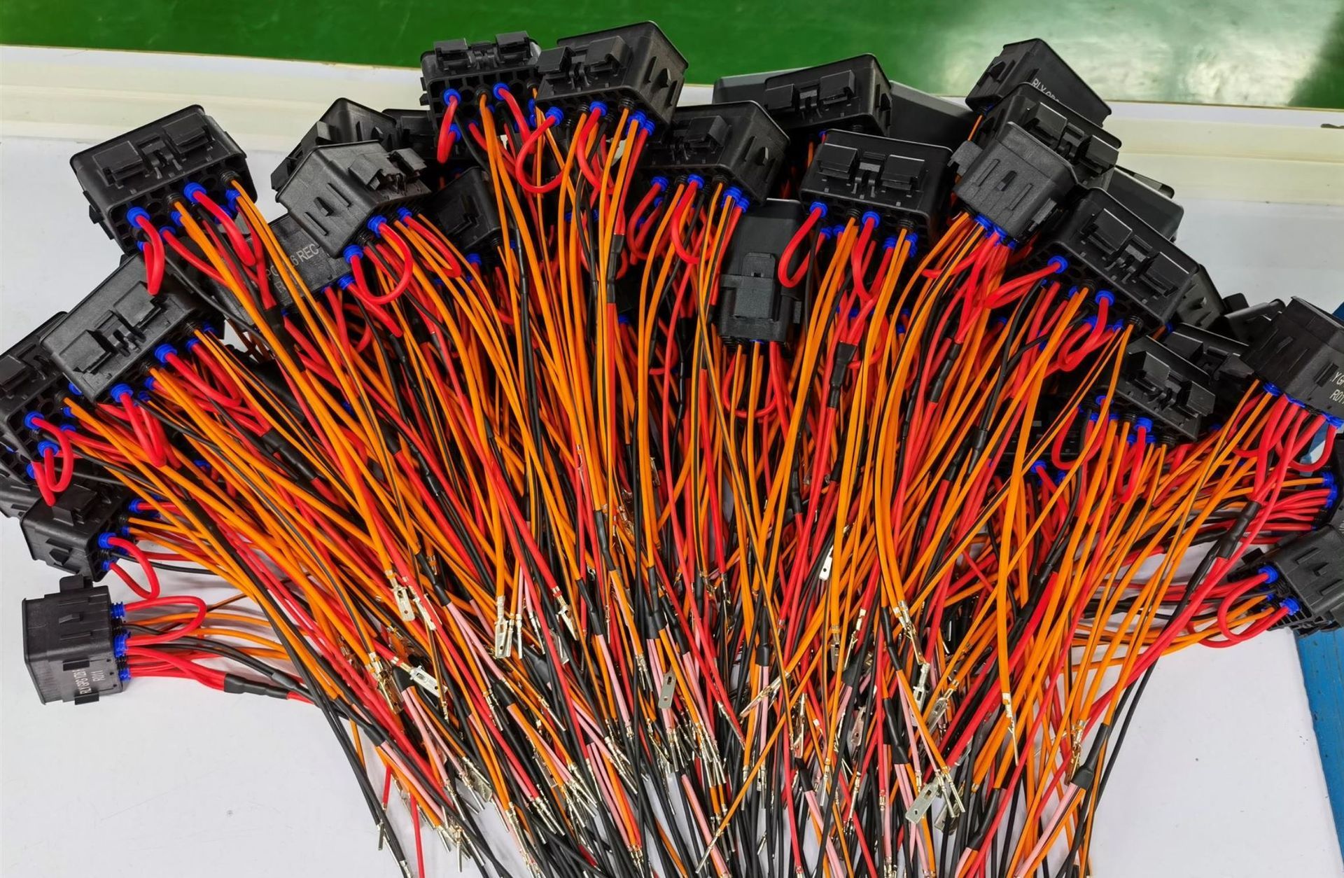 A bunch of wires are stacked on top of each other on a table.