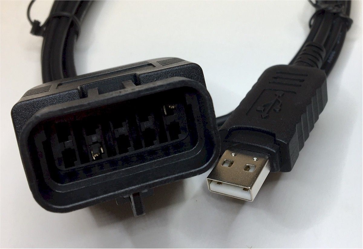 A close up of a usb cable with a black connector