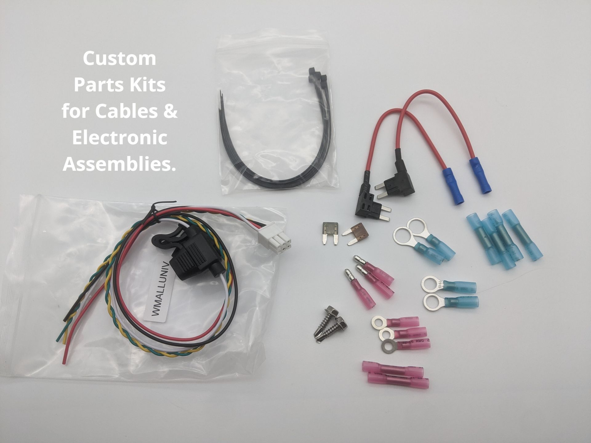 A bag of custom parts kits for cables and electronic assemblies