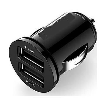 A car charger with two usb ports on a white background.