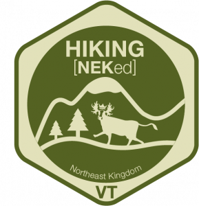 Green hiking patch with a moose, trees, and mountains. Text says 