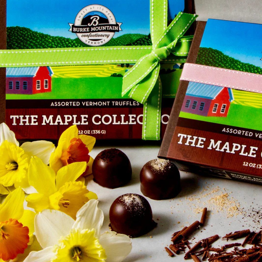 Maple truffles with daffodil flowers and gift boxes with green ribbon.