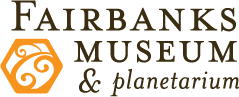 Logo for Fairbanks Museum & Planetarium; Features an orange hexagon with a swirl design, and brown text.