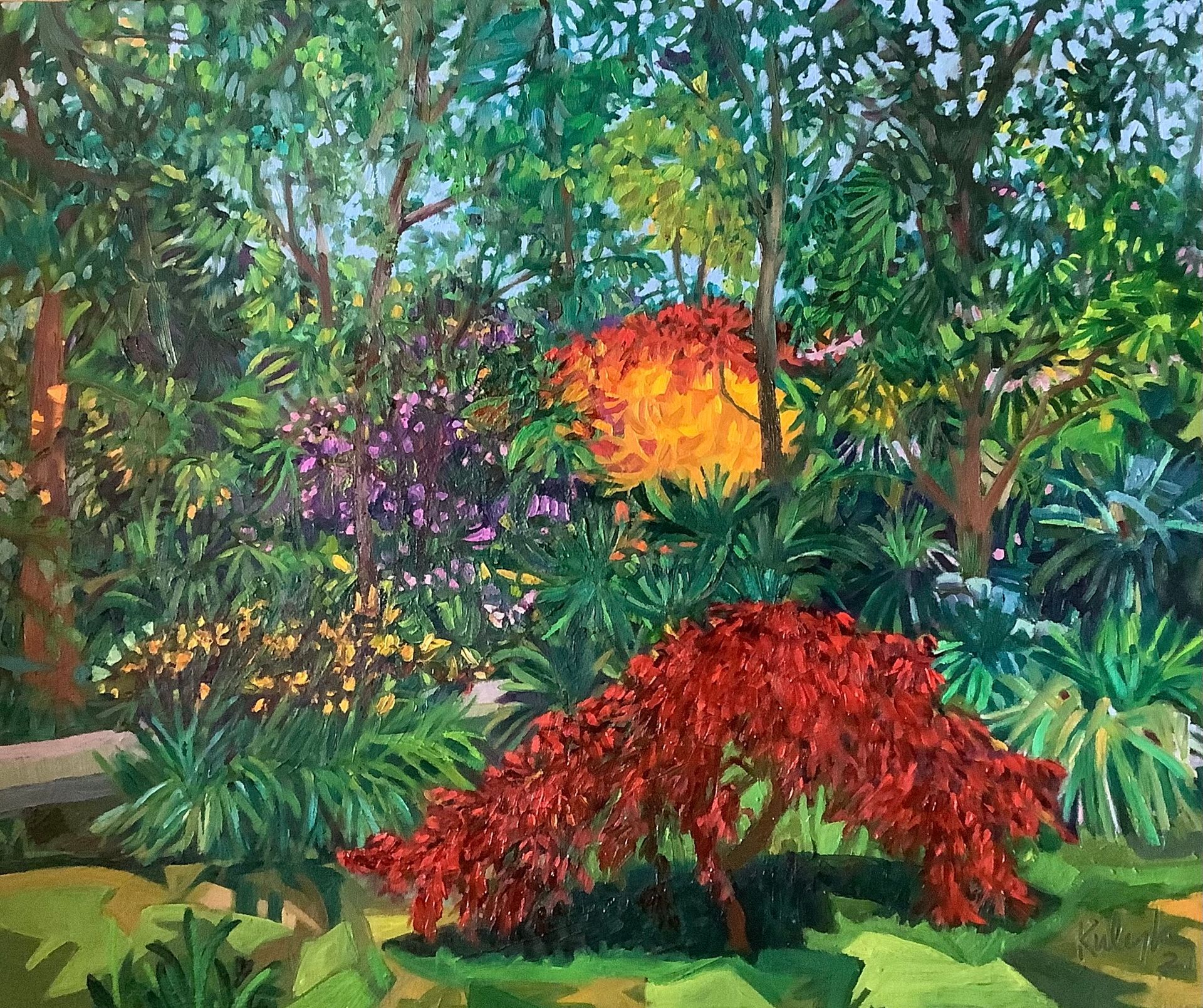 ©Karen Kulyk - Lush garden scene with a red tree in the foreground and vibrant foliage.