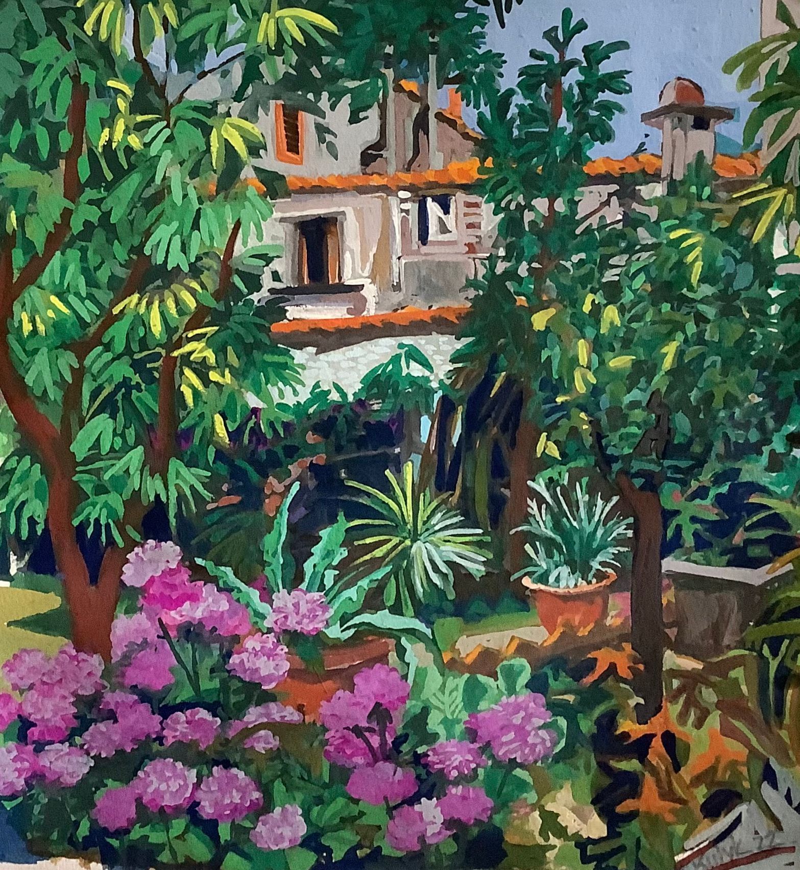 ©Karen Kulyk - Lush garden with pink flowers, potted plants, trees, and a building in the background.