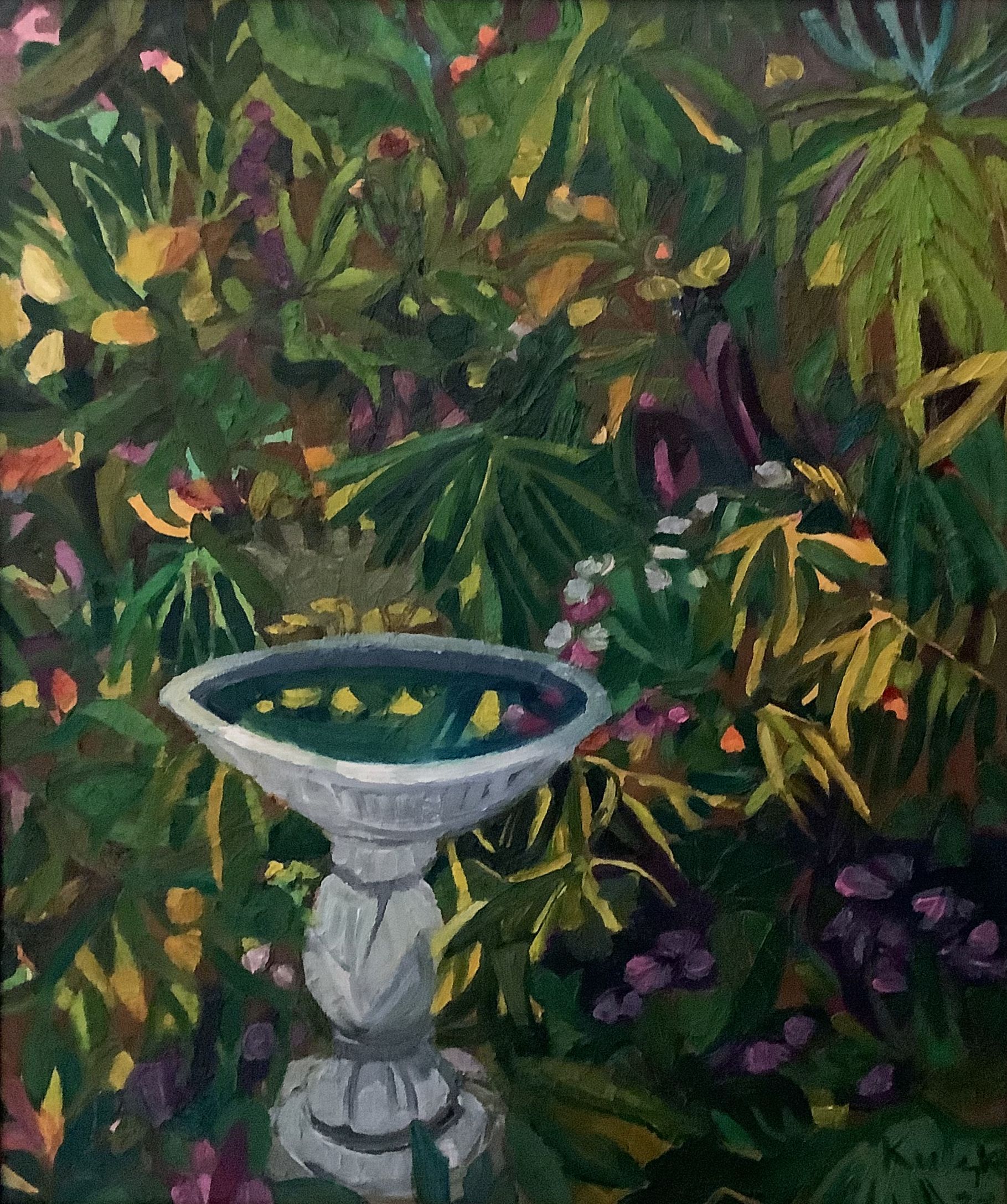 ©Karen Kulyk - Birdbath in a lush garden, surrounded by green and colorful foliage.