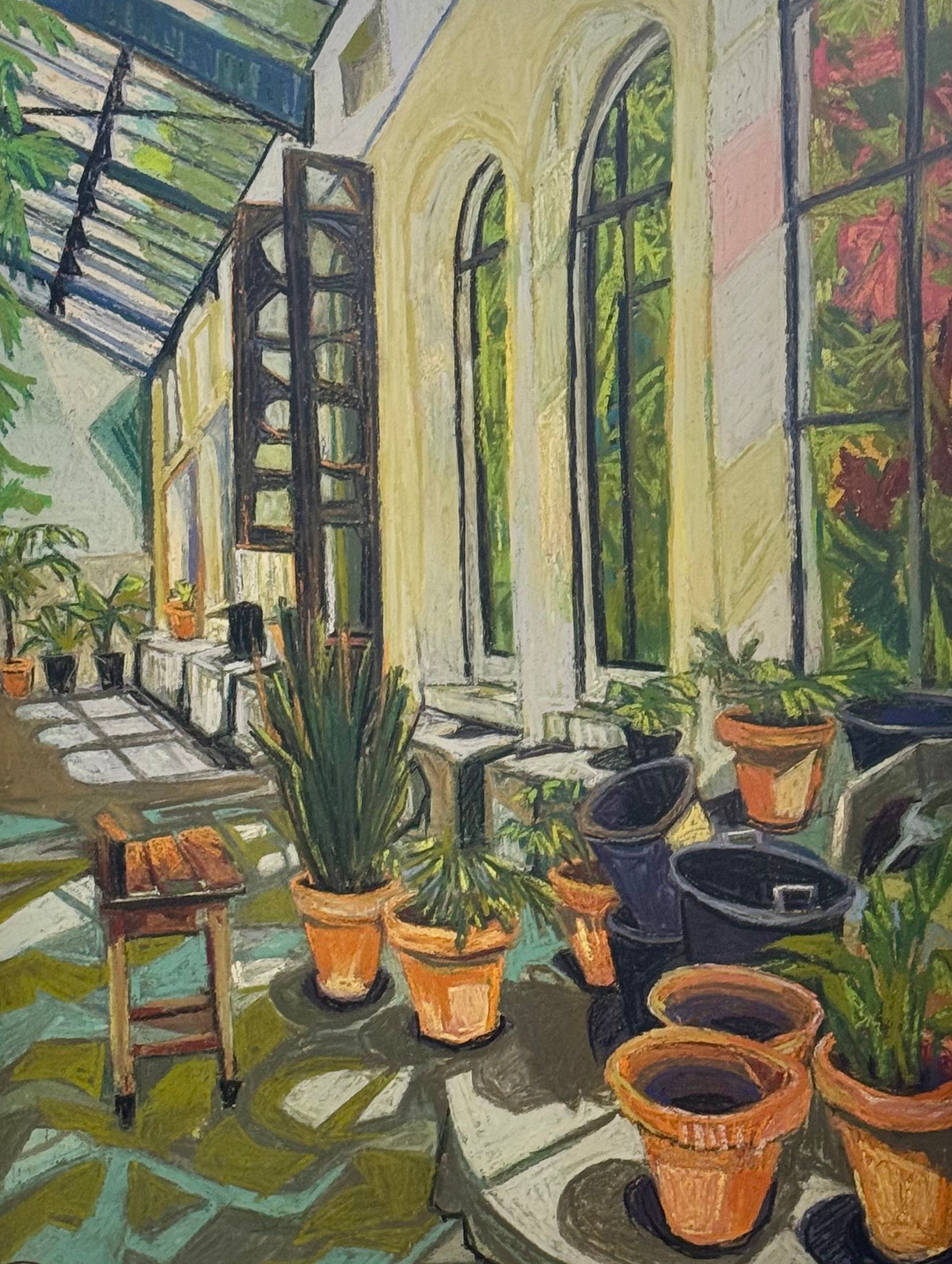 ©Karen Kulyk - Sunlit conservatory with potted plants, arched windows, and open door.